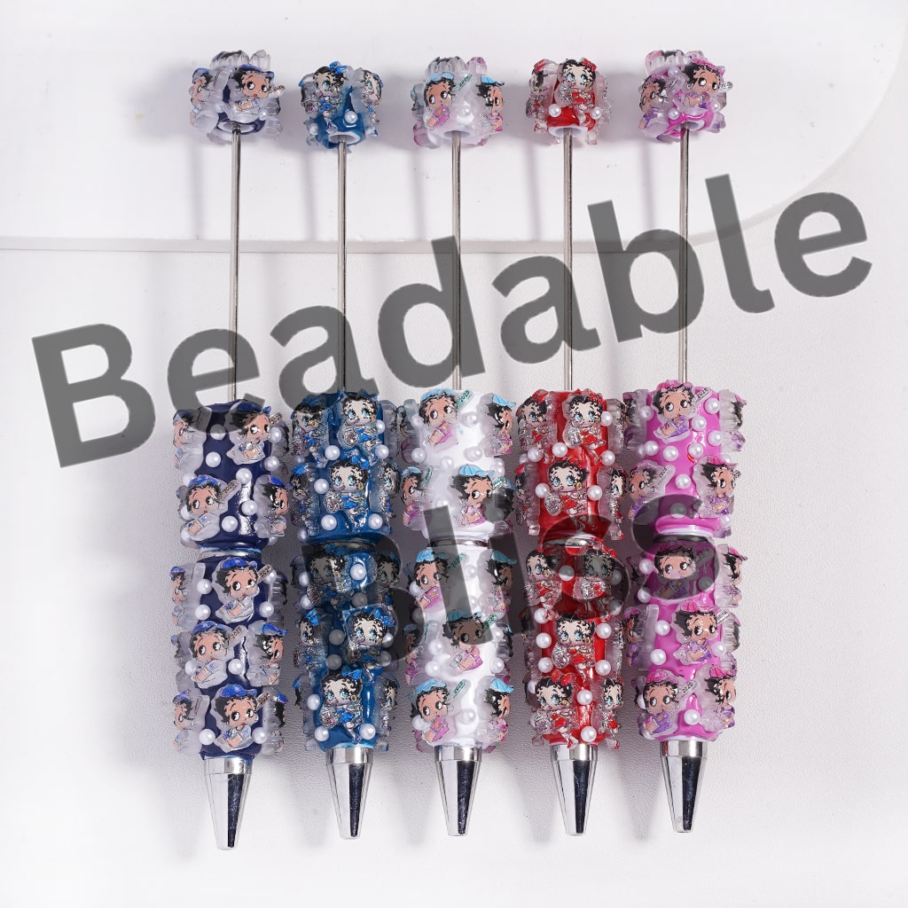 Set of decorative pens with cartoon character designs on a white background, branded 'beadableliss'.