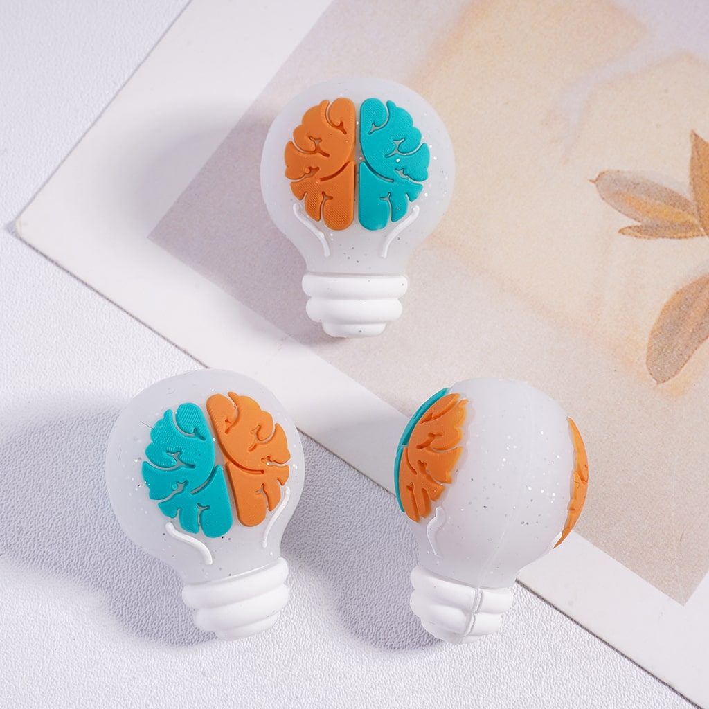 3D White Bulb Silicone Focal Bead with Teal & Orange Brain and Silver Glitter