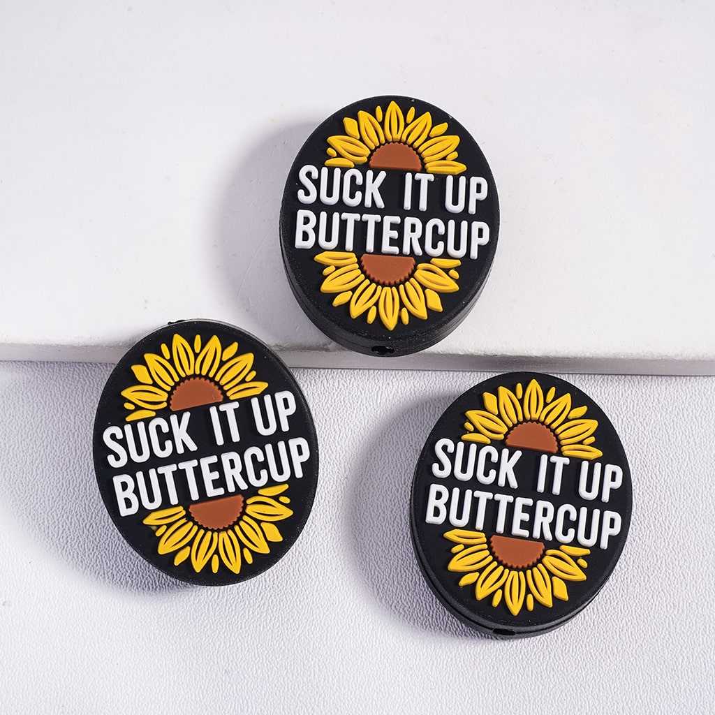 Flat Black Oval Shape Silicone Focal Beads with ‘Suck It Up Buttercup’ Text & Sunflowers