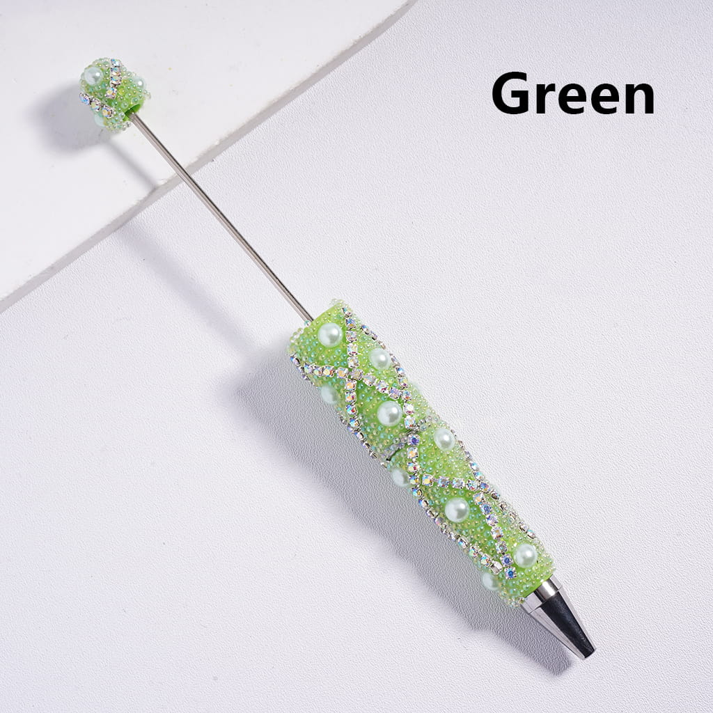 Decorative pen with green accents on a light gray background