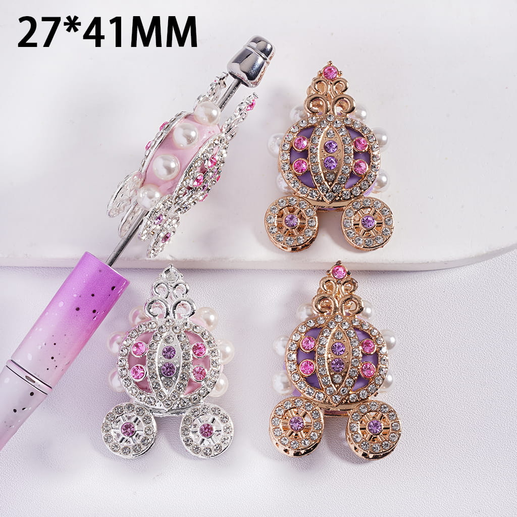 Decorative earrings with pink and purple accents on a white background