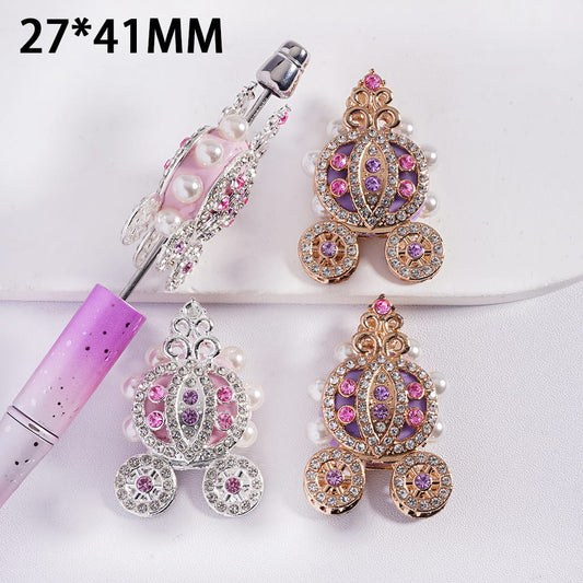 Decorative earrings with pink and purple accents on a white background