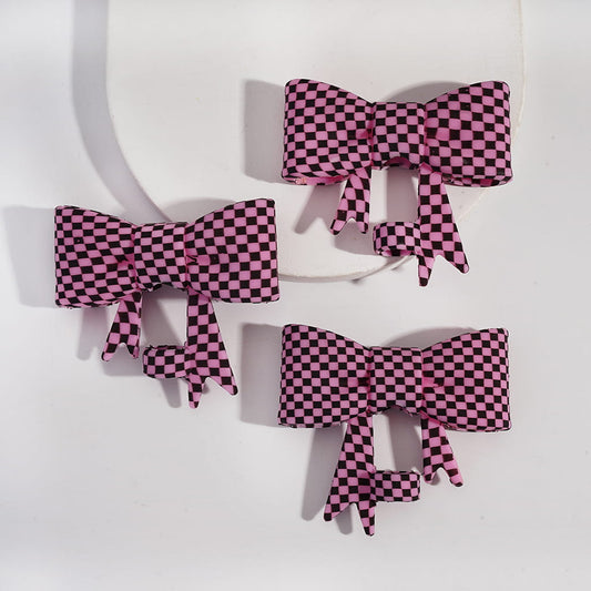 Food‑Grade Silicone Bowtie Straw Topper with Pink & Black Checkered Design