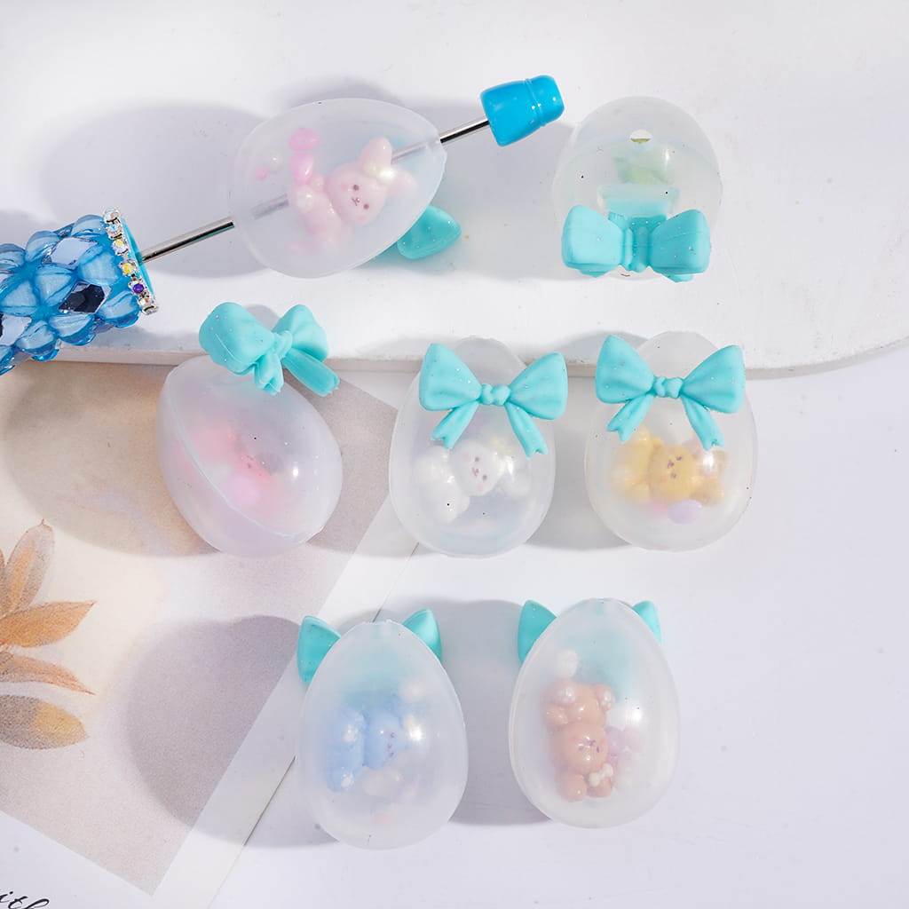 Easter Egg with Teal Bowtie and Bunny Stones Soft Silicone Shaker Beads Stones Decoration Embedded Inside bead