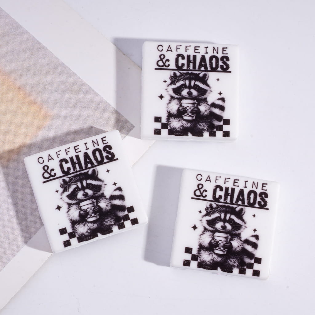 Raccoon Holding Coffee Cup “Caffeine & Chaos” Flat Square Silicone Focal Bead