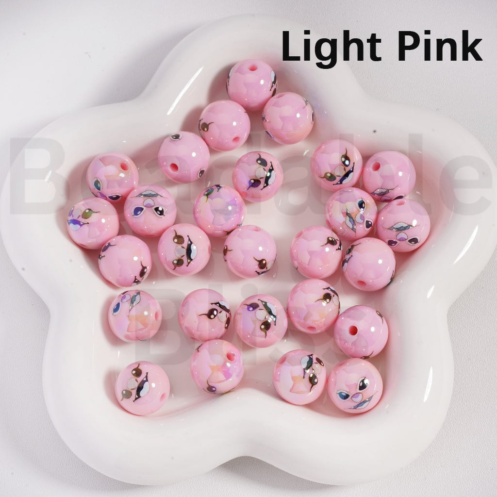 Light pink beads with small decorative figures on a white dish, labeled 'Light Pink'.

