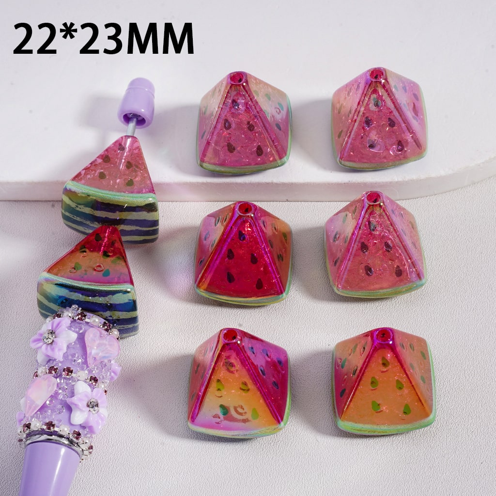 Colorful geometric dice with watermelon pattern on a white background

