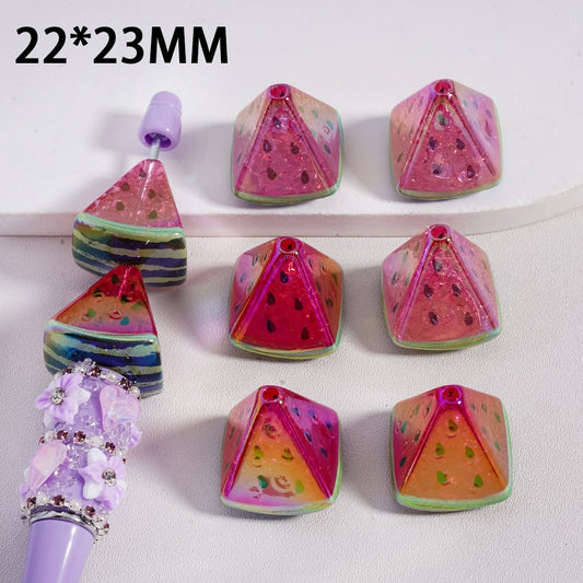 Colorful geometric dice with watermelon pattern on a white background

