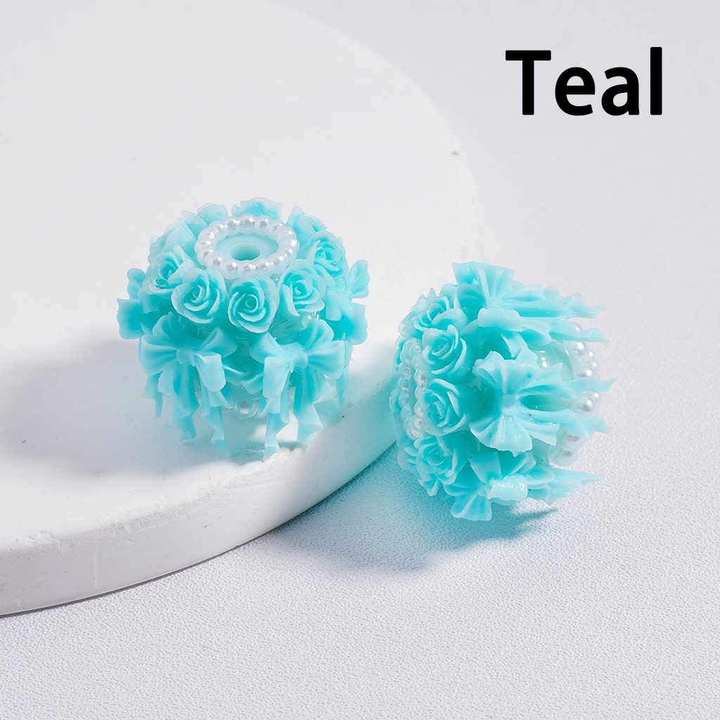 Teal flower-shaped objects on a white background with 'Teal' text.

