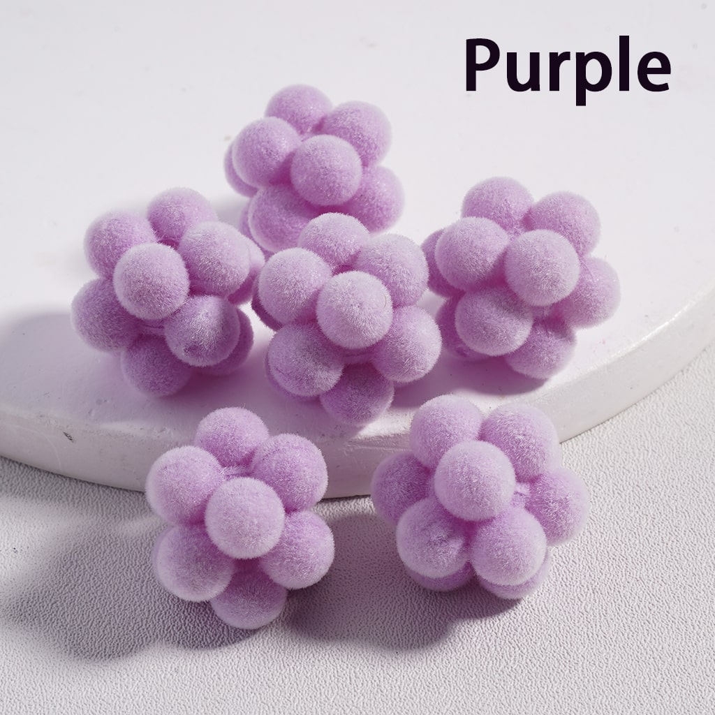 Purple decorative balls on a white surface with 'Purple' text above.

