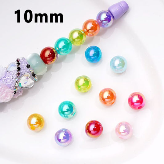 A collection of glossy colorful UV coating shiny round acrylic beads in various colors, with the size indicated as 10mm.

