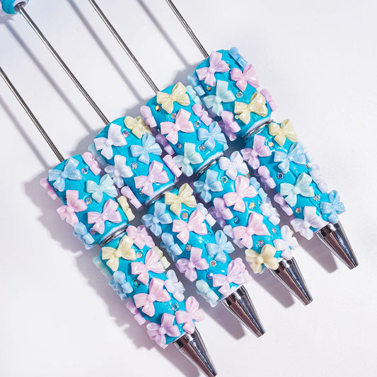 Glitter Bowknot Design with Sparkling AB Rhinestones on Blue Background Beadable Clay Pens