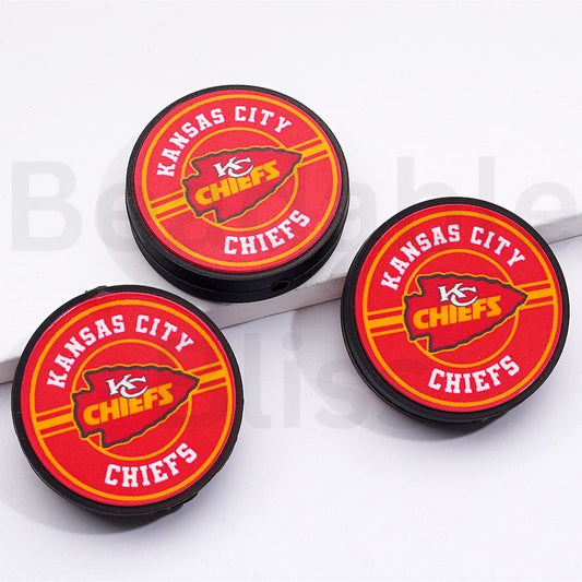 Three Kansas City Chiefs logo buttons on a white background

