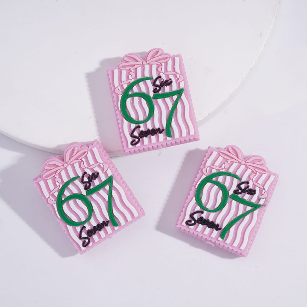 Gift Box with ‘67’ & ‘SIX SEVEN’ Text” Silicone Focal Beads