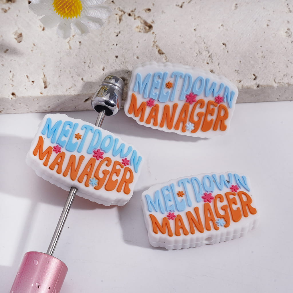 White Silicone Focal Beads with Blue Orange Text "MELT DOWN MANAGER"