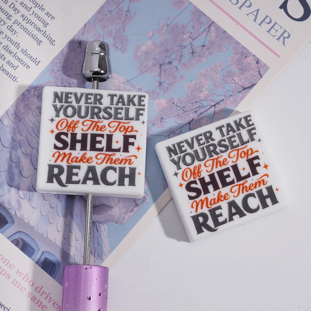 Flat Square Shape Silicone Focal Bead with “Never Take Yourself Off the Top Shelf, Make Them Reach” Quote,