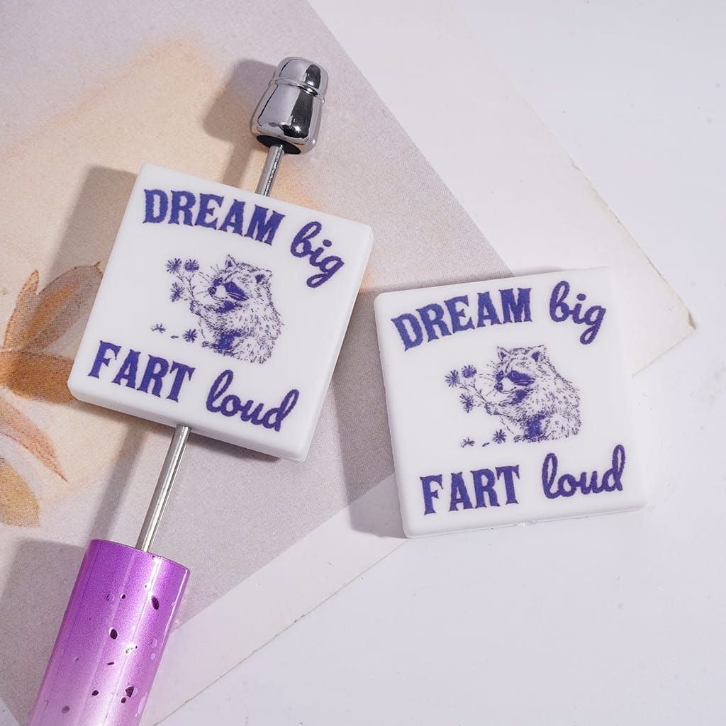 Flat Square Shape Silicone Focal Bead with Text “Dream Big Humor Loud!” & Raccoon Blowing Dandelions