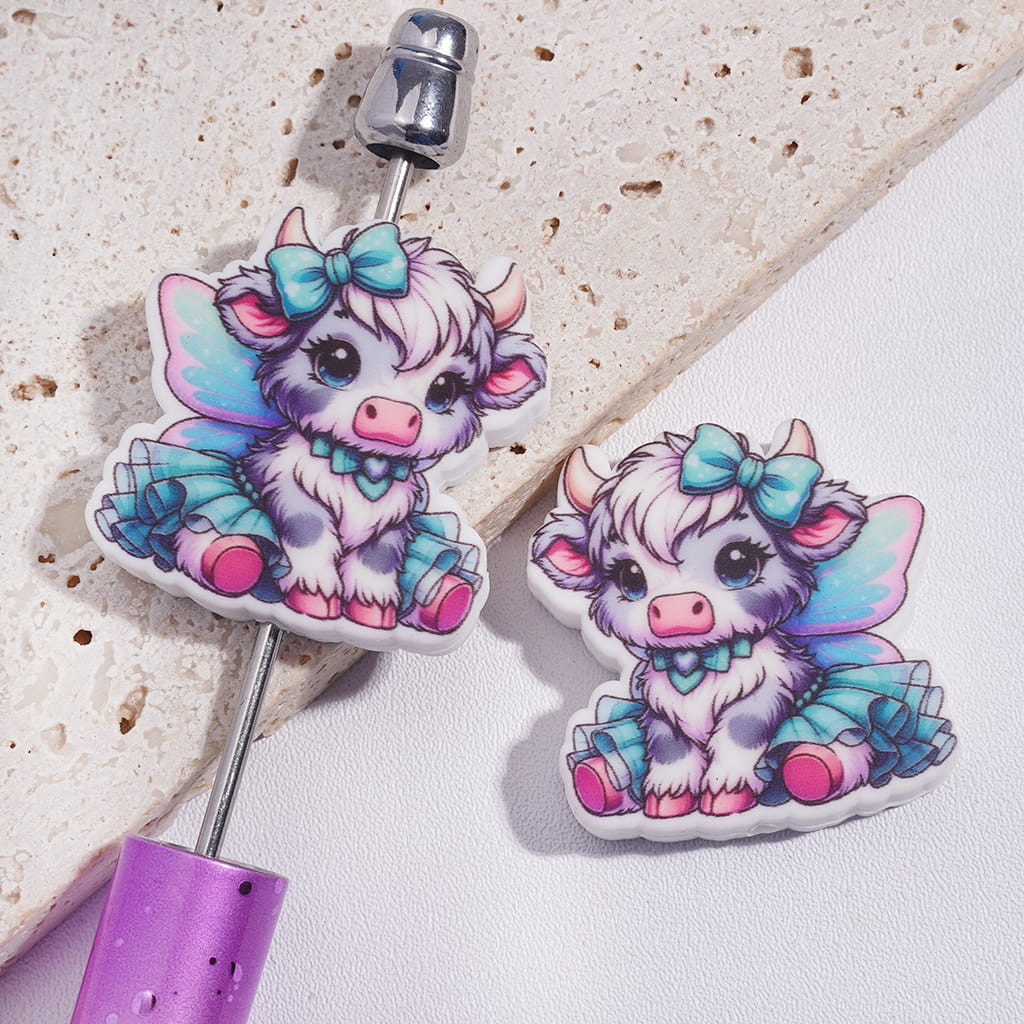 Pretty Highland Cow with Blue Gauzy Skirt and Butterfly Wings, Whimsical Farm Animal Design Silicone Focal Beads