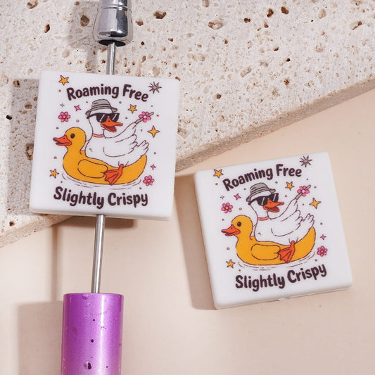 White Goose on Yellow Rubber Duck with Text "Roaming Free Slightly Crispy" Flat Square Shape Silicone Focal Beads