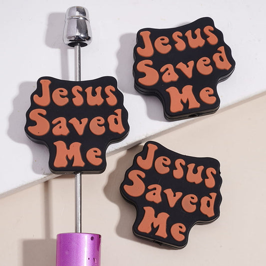 Brown-Orange Text "Jesus Saved Me" on Black Background Silicone Focal Beads