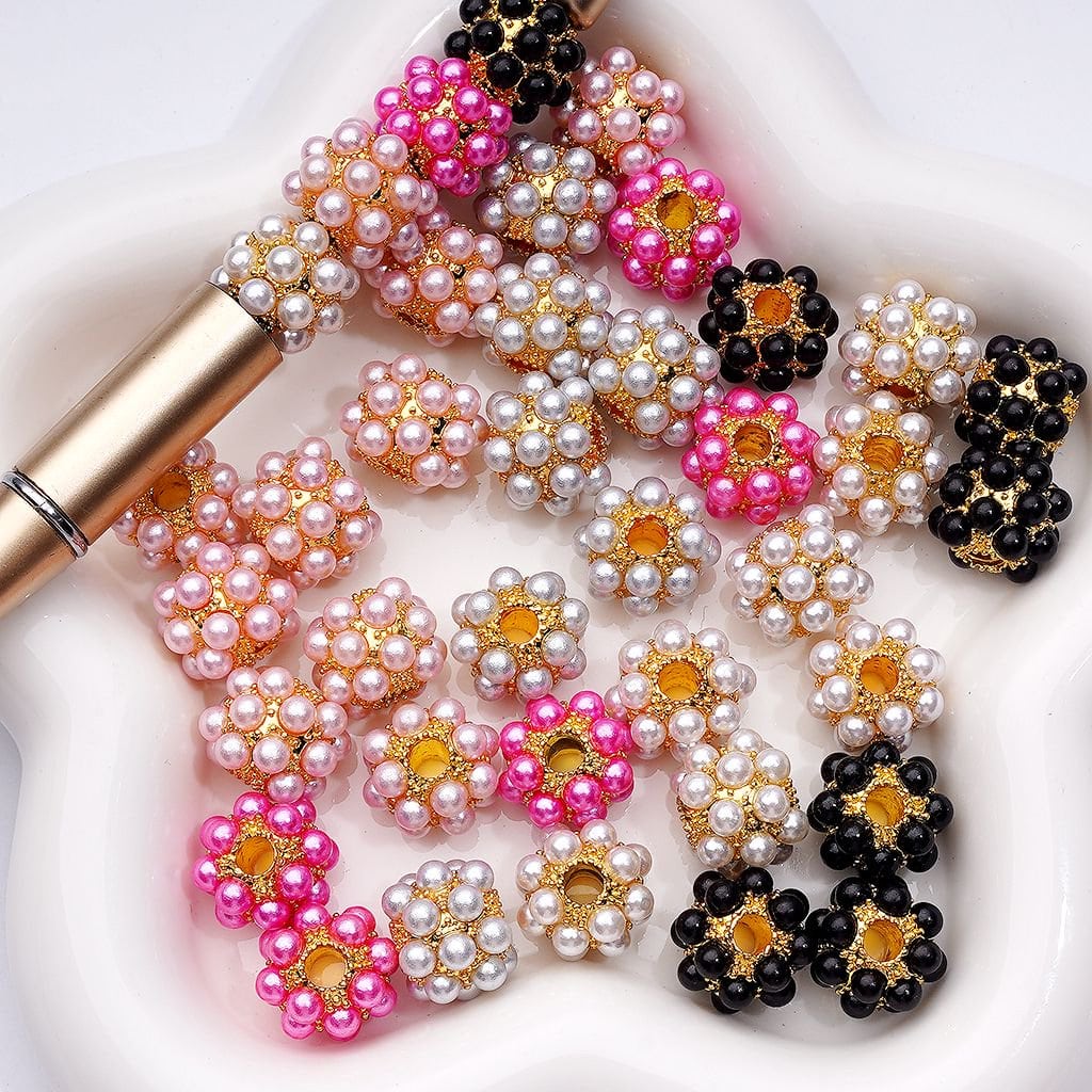 Decorative hair accessories with pearls and gemstones on a white background

