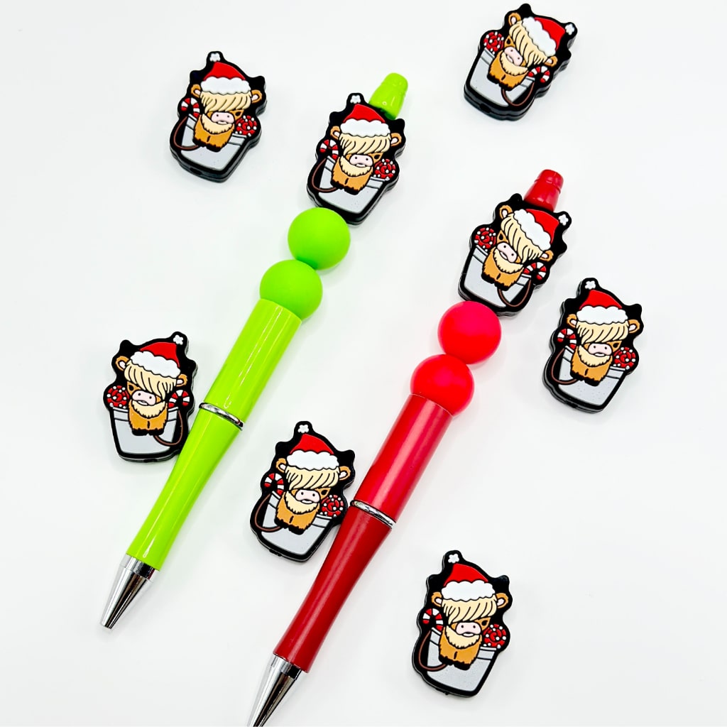 Cute Little Highland Cow in a Red Christmas Hat Sits in a Bucket Silicone Focal Beads