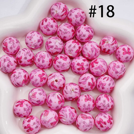 Double Tone Dark & Light Pink Bows & Mini Stars Prints Pink Base Round Silicone Beads 15MM